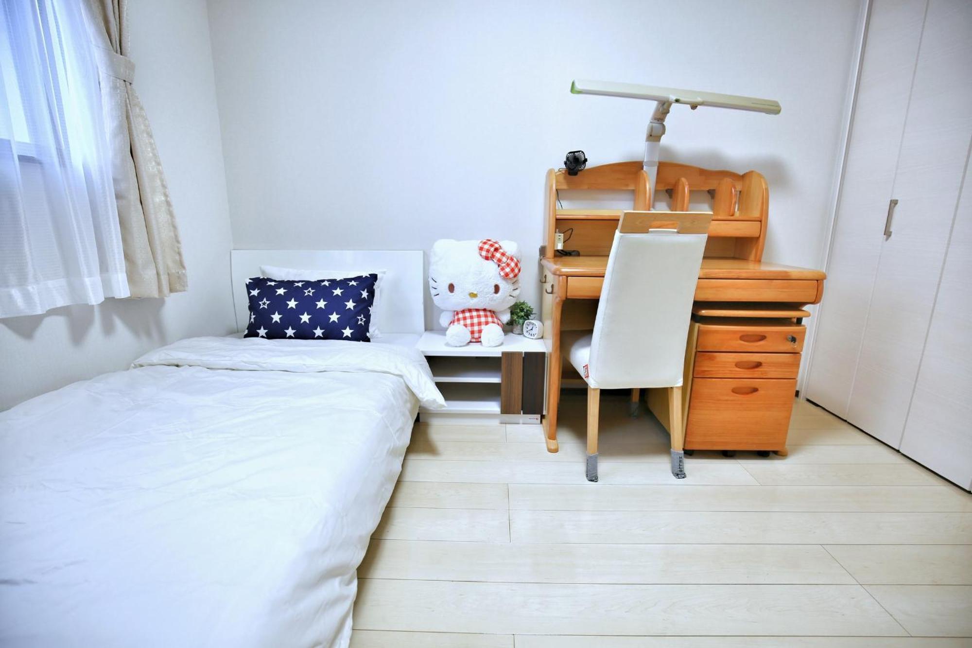 アキラ商事 Habitación en casa particular