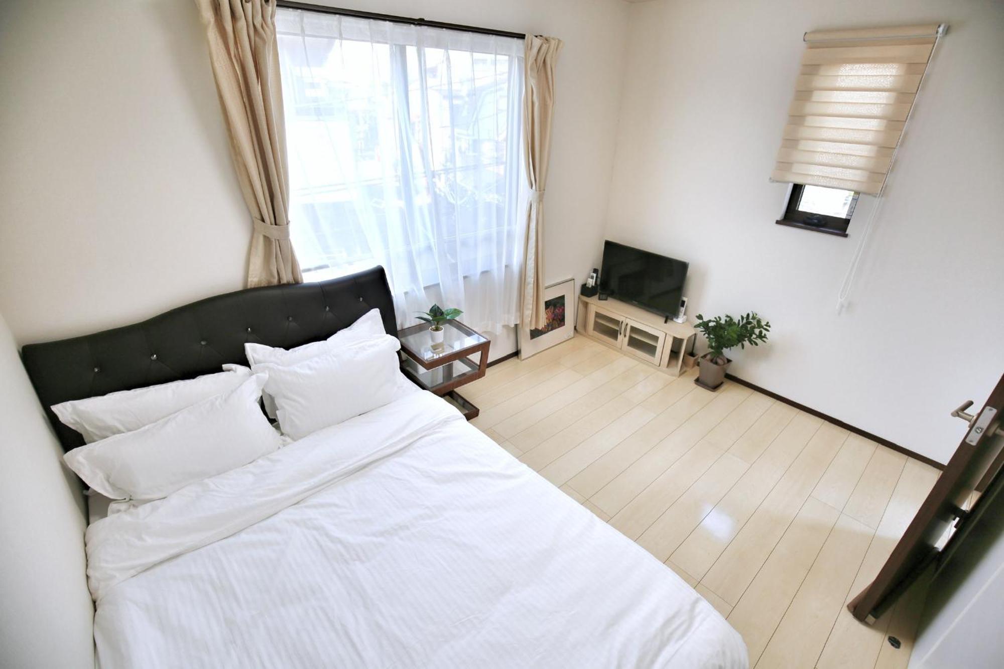 アキラ商事 Habitación en casa particular