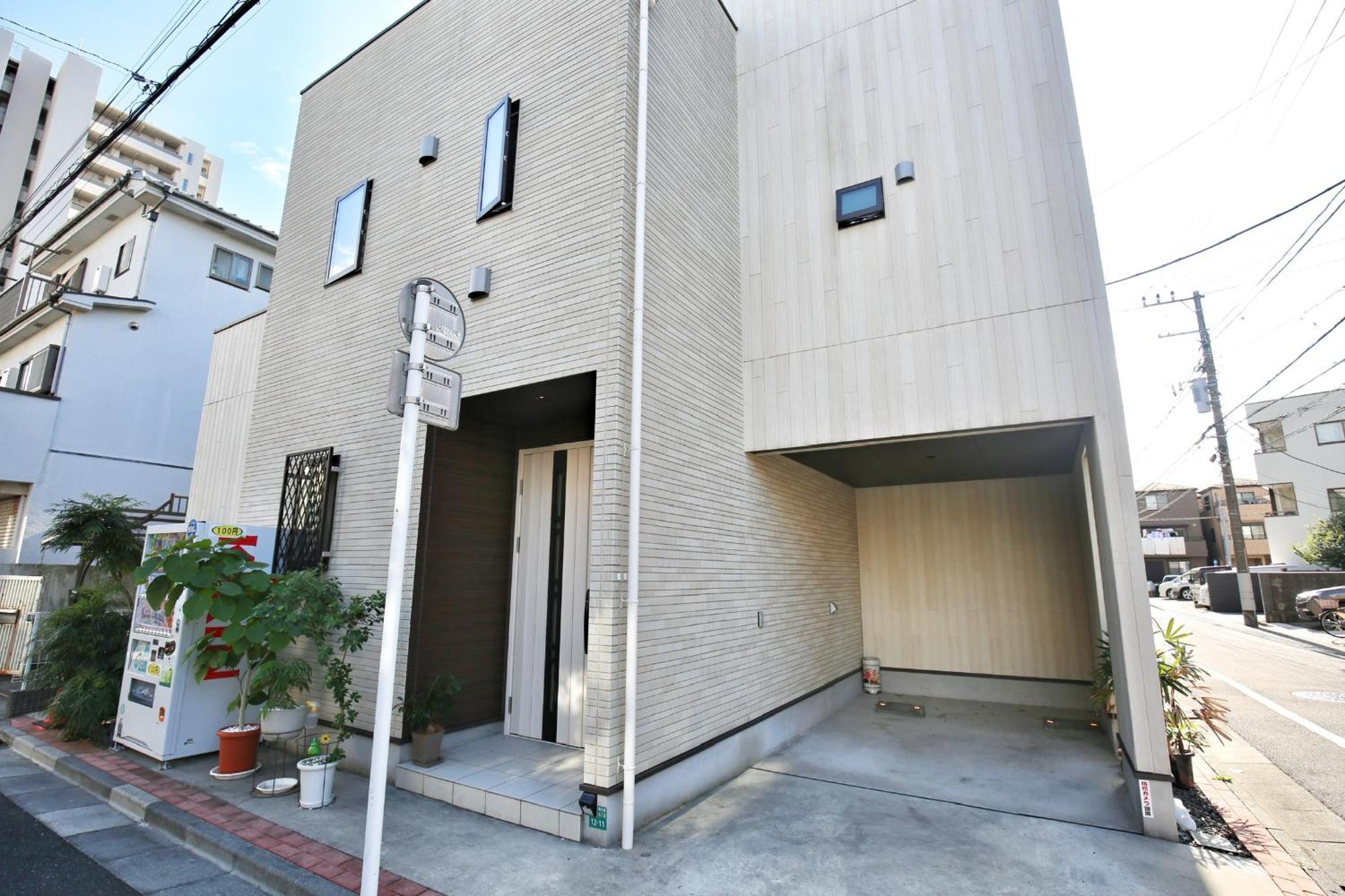 アキラ商事 Habitación en casa particular *